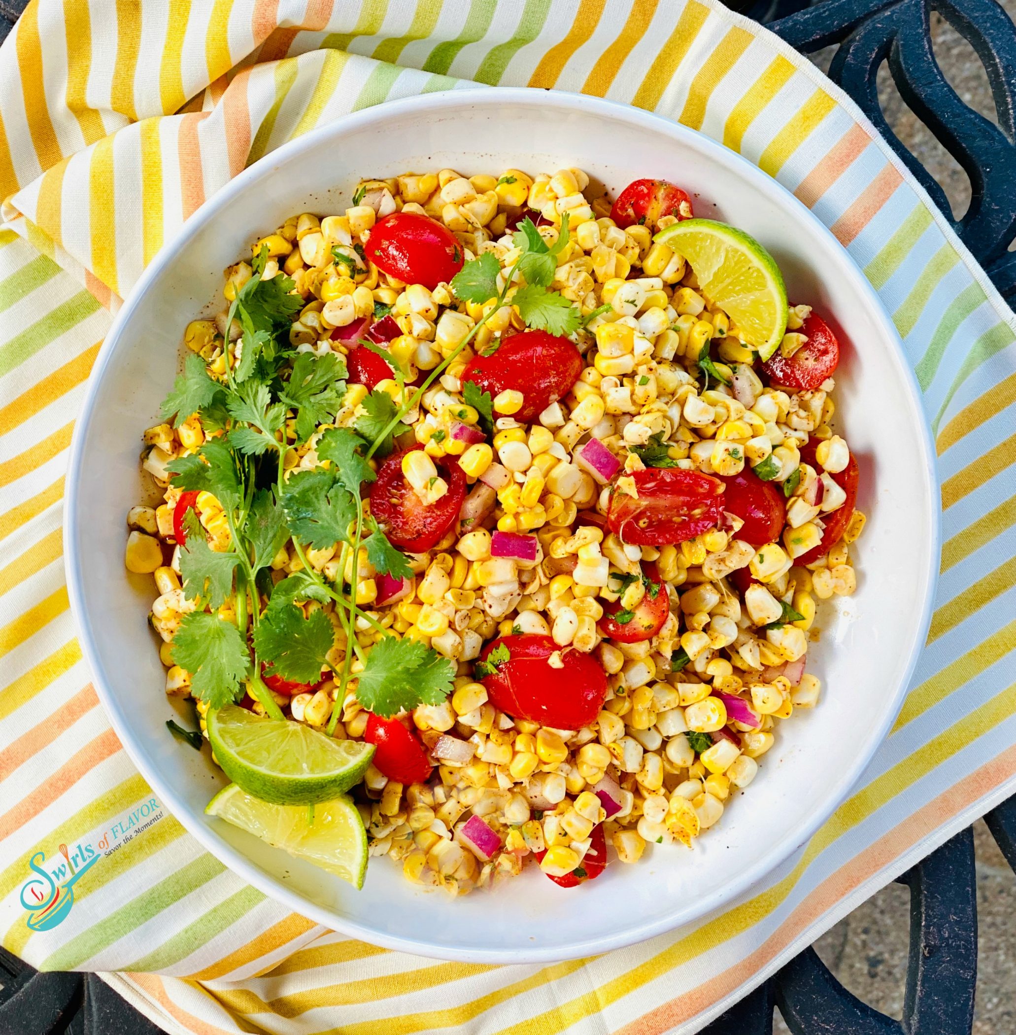 overhead photo of corn and tomato salad