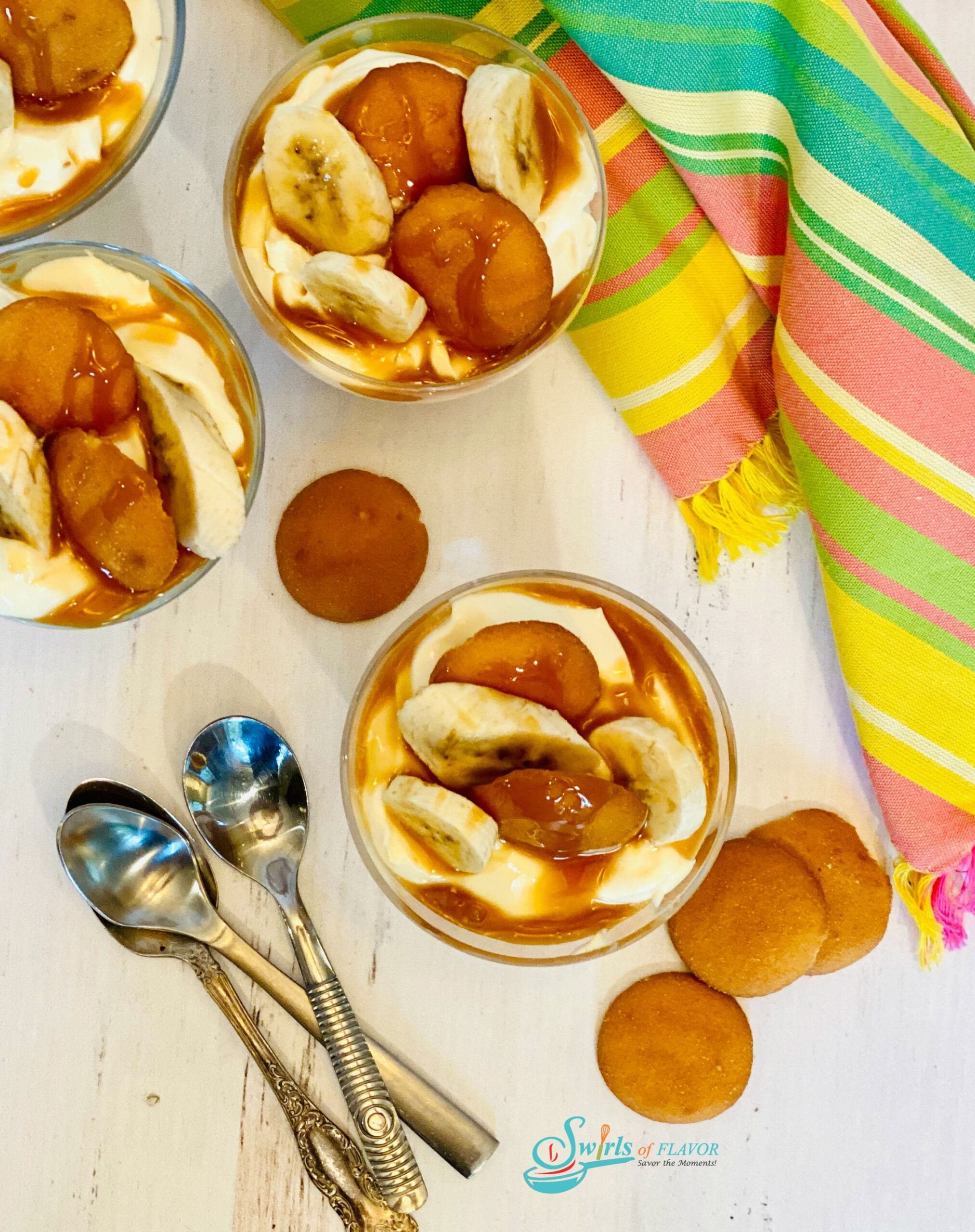 overhead photo of four servings of banana pudding with nilla wafers