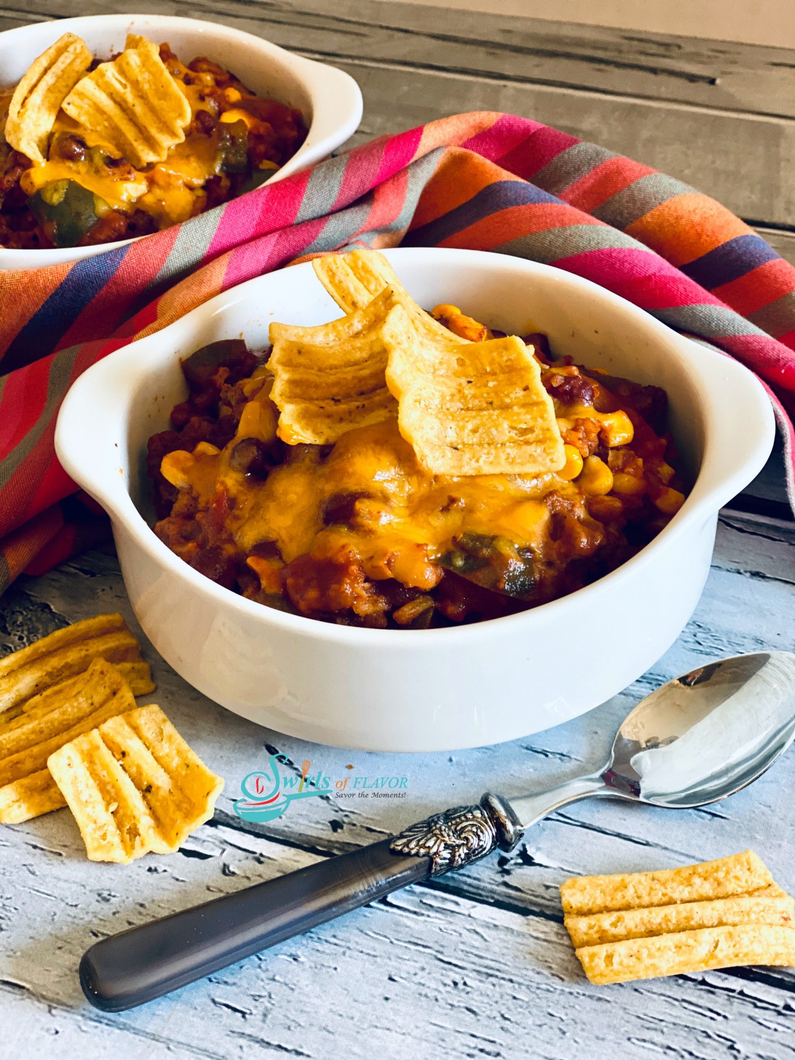 bowl of ground beef chili with spoon