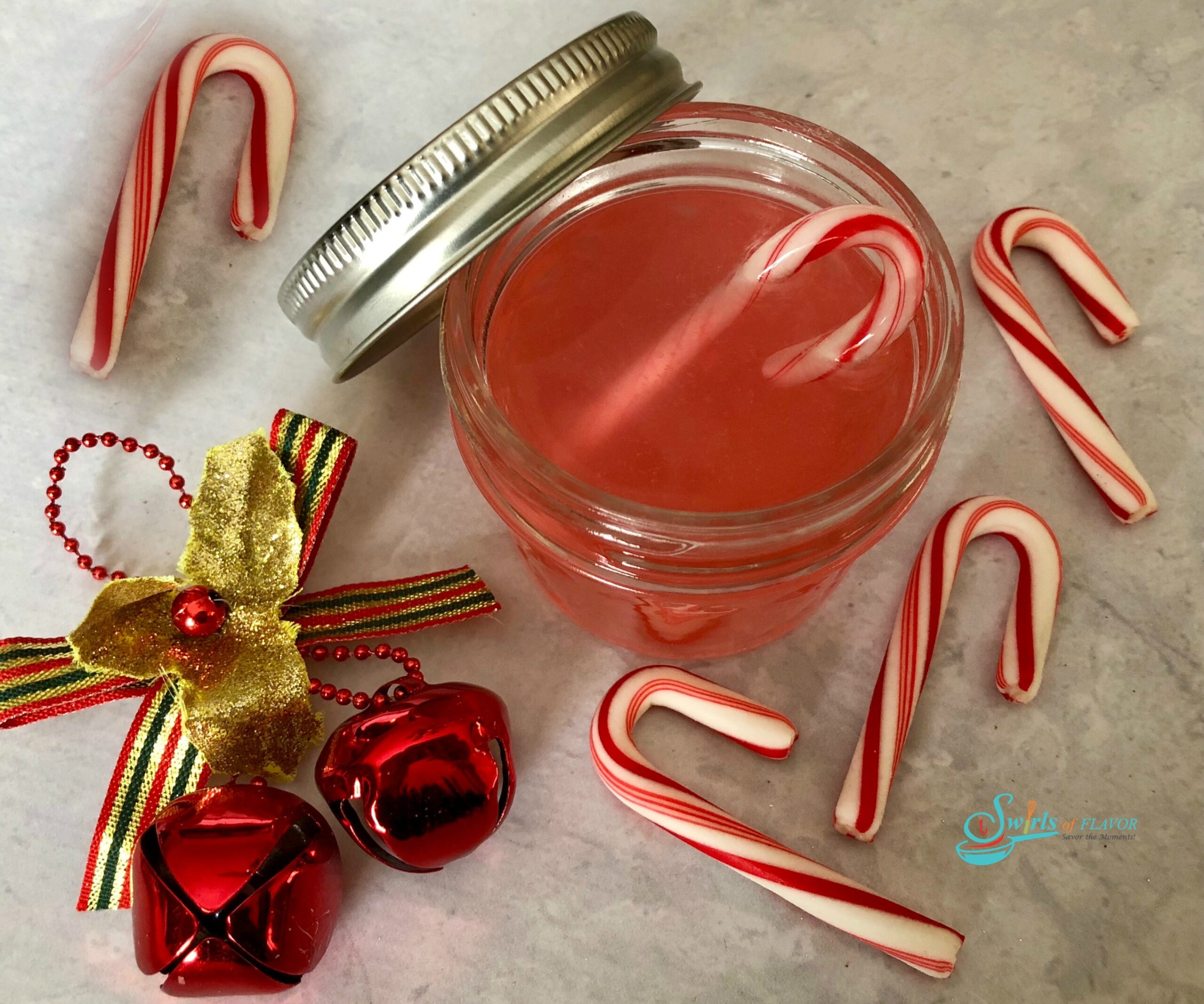 peppermint vodka in mason jars with candy canes