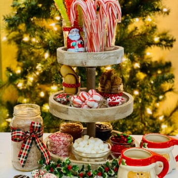 three tiered stand with hot cocoa bar ingredients