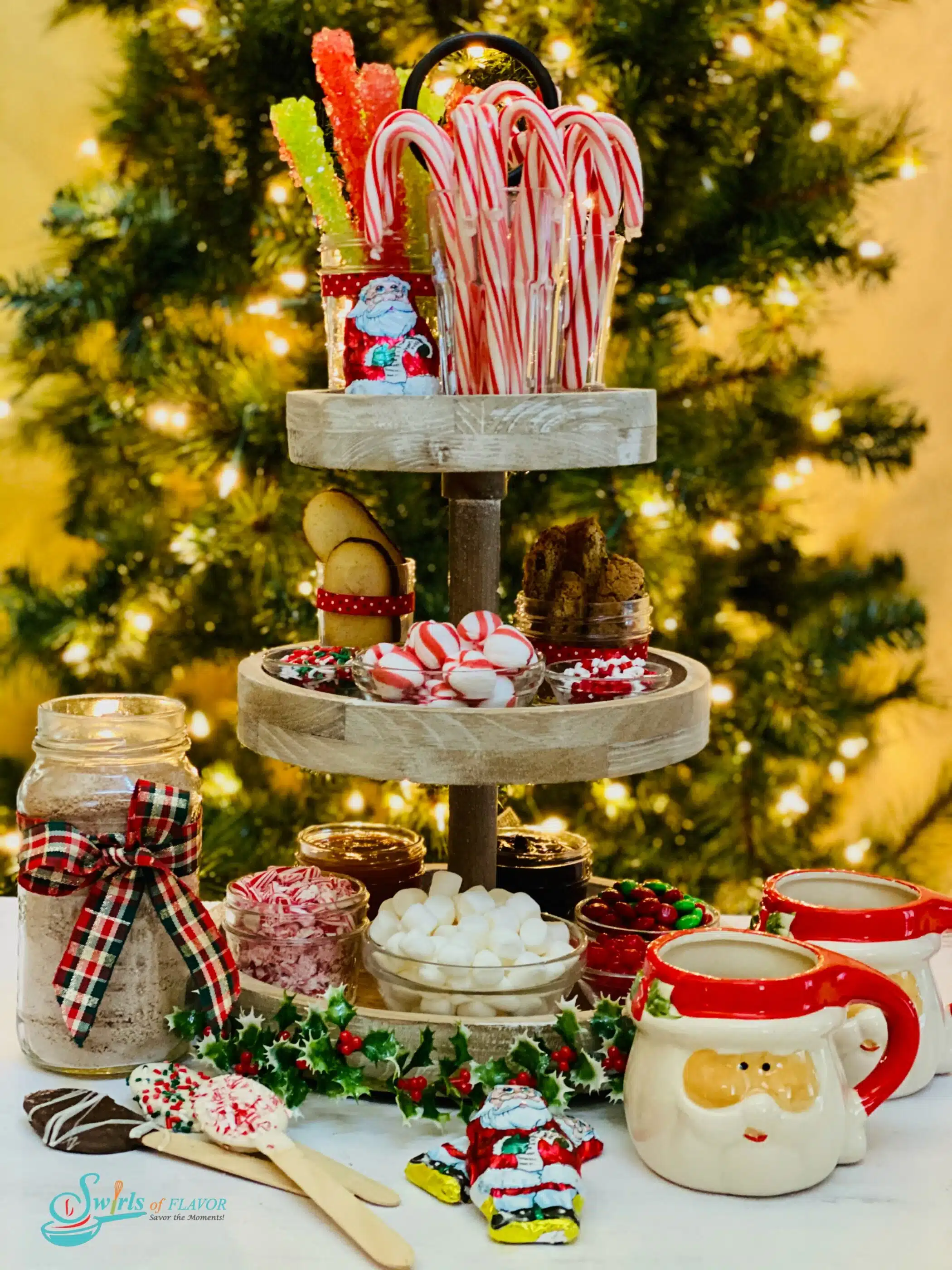 three tier tray with hot cocoa bar ingredients