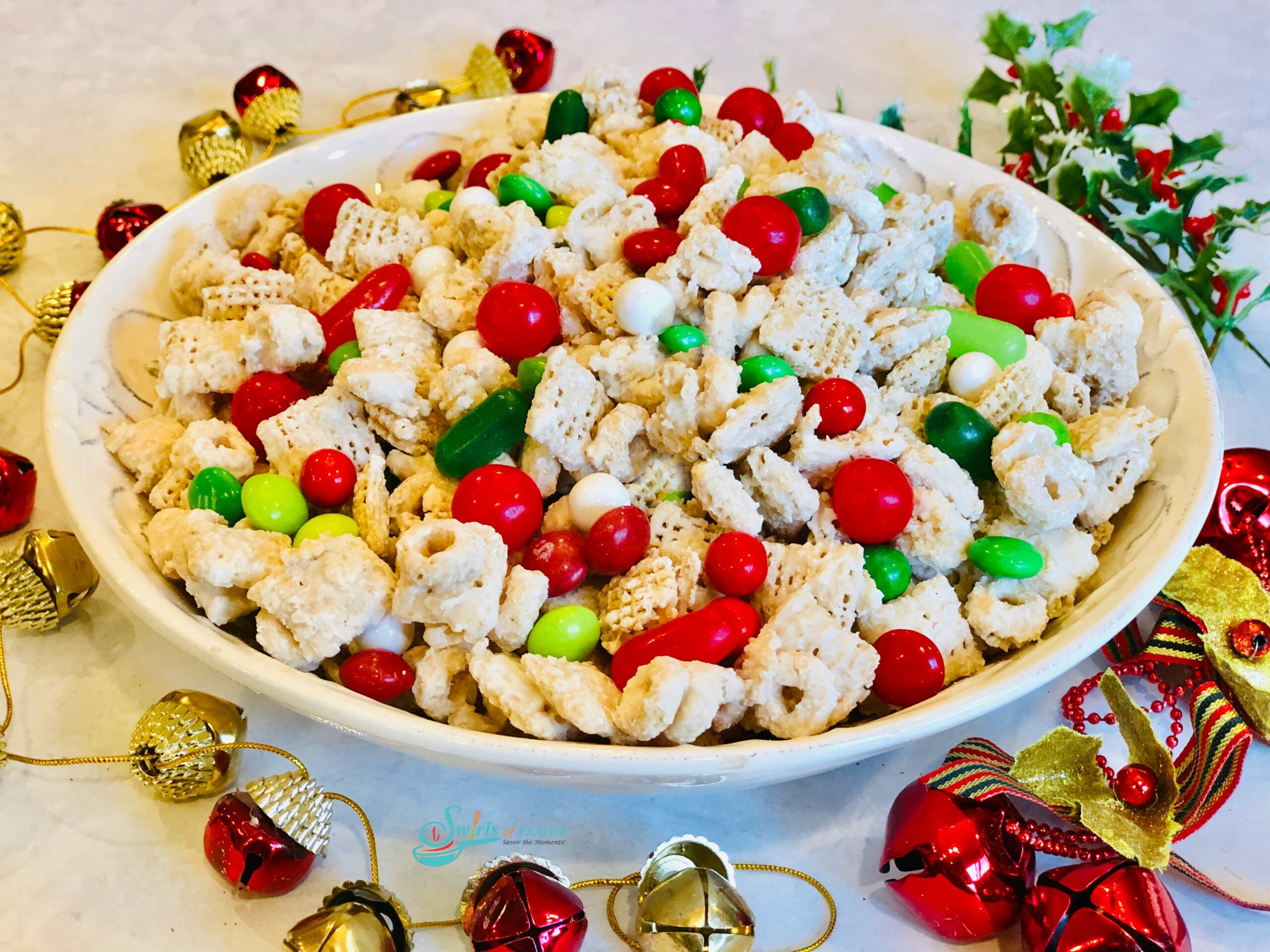 Christmas chex mix in white bowl