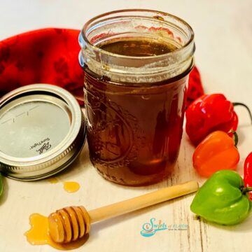 homemade hot honey in mason jar with fresh peppers