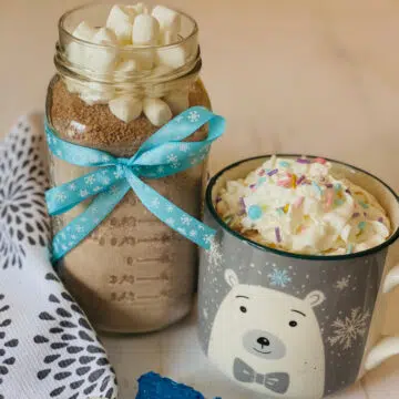 homemade hot chocolate mix in a jar with mug of hot chocolate