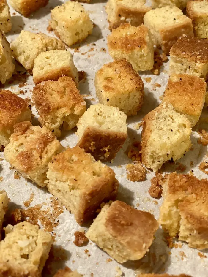 baked homemade croutons on baking sheet