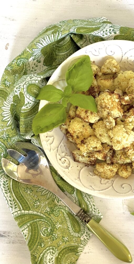 overhead picture of half a bowl of air fryer cauliflower