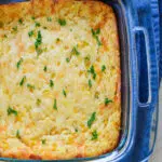 cornbread casserole in baking dish with text overlay