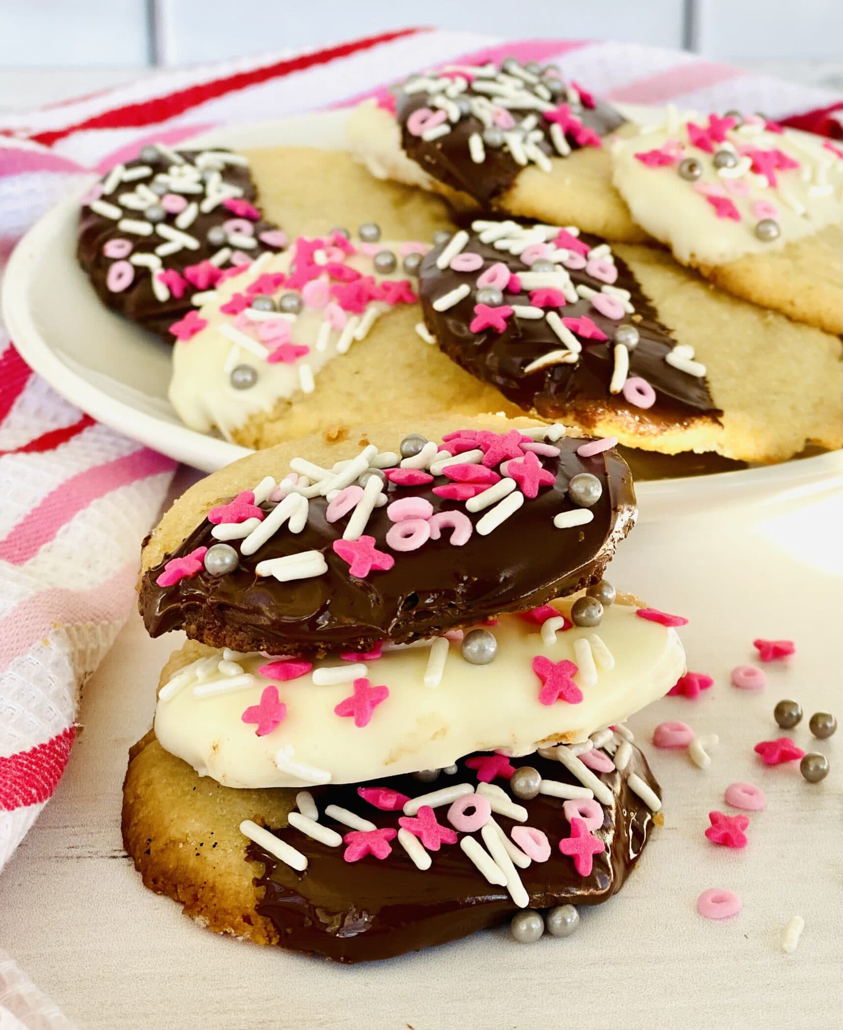 stack of cookies and cookies on a dish