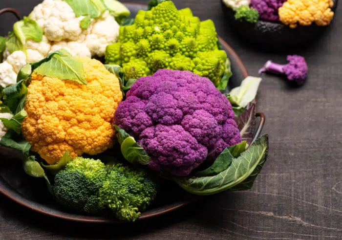 white, purple, orange and romanesco cauilflower