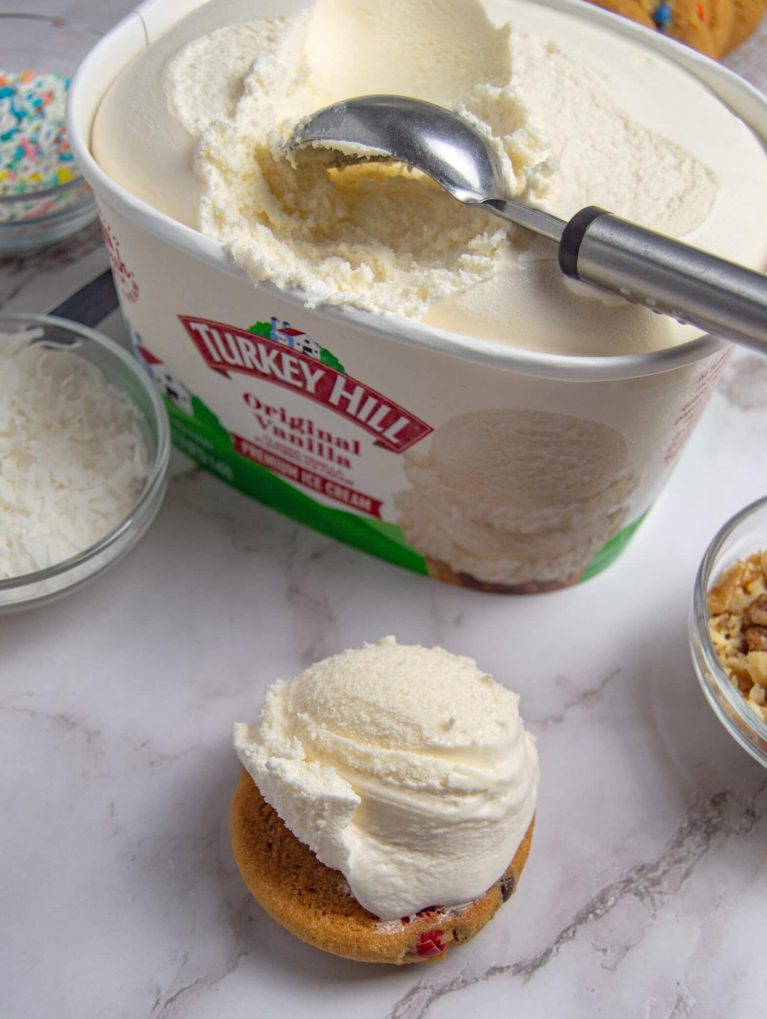 scooping ice cream on a cookie