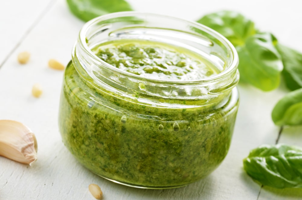 glass jar filled with pesto