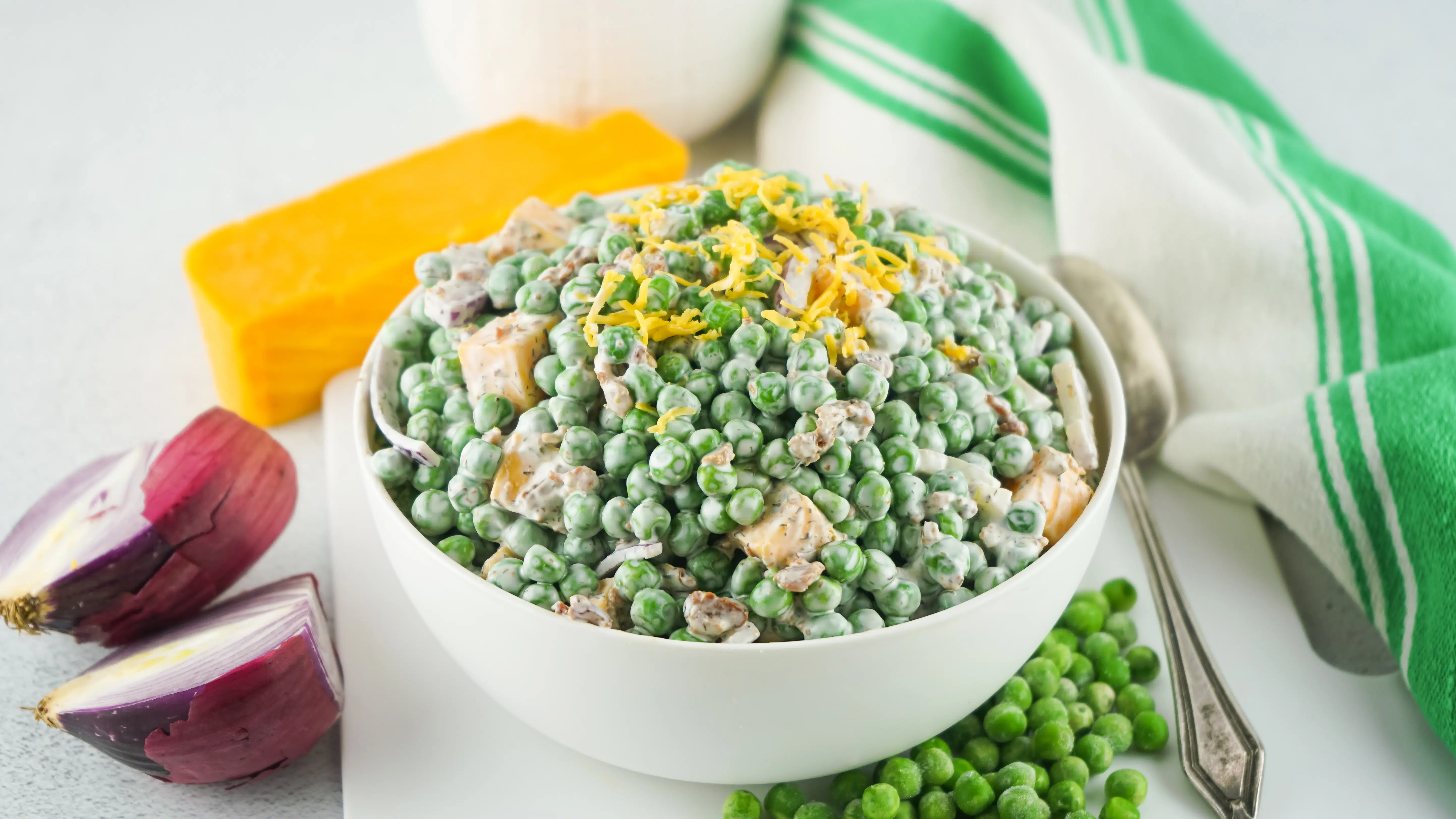 old fashioned pea salad with onion and cheese