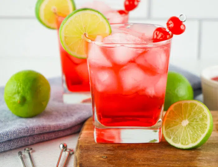 dirty Shirley Temple in glass with lime and cherry