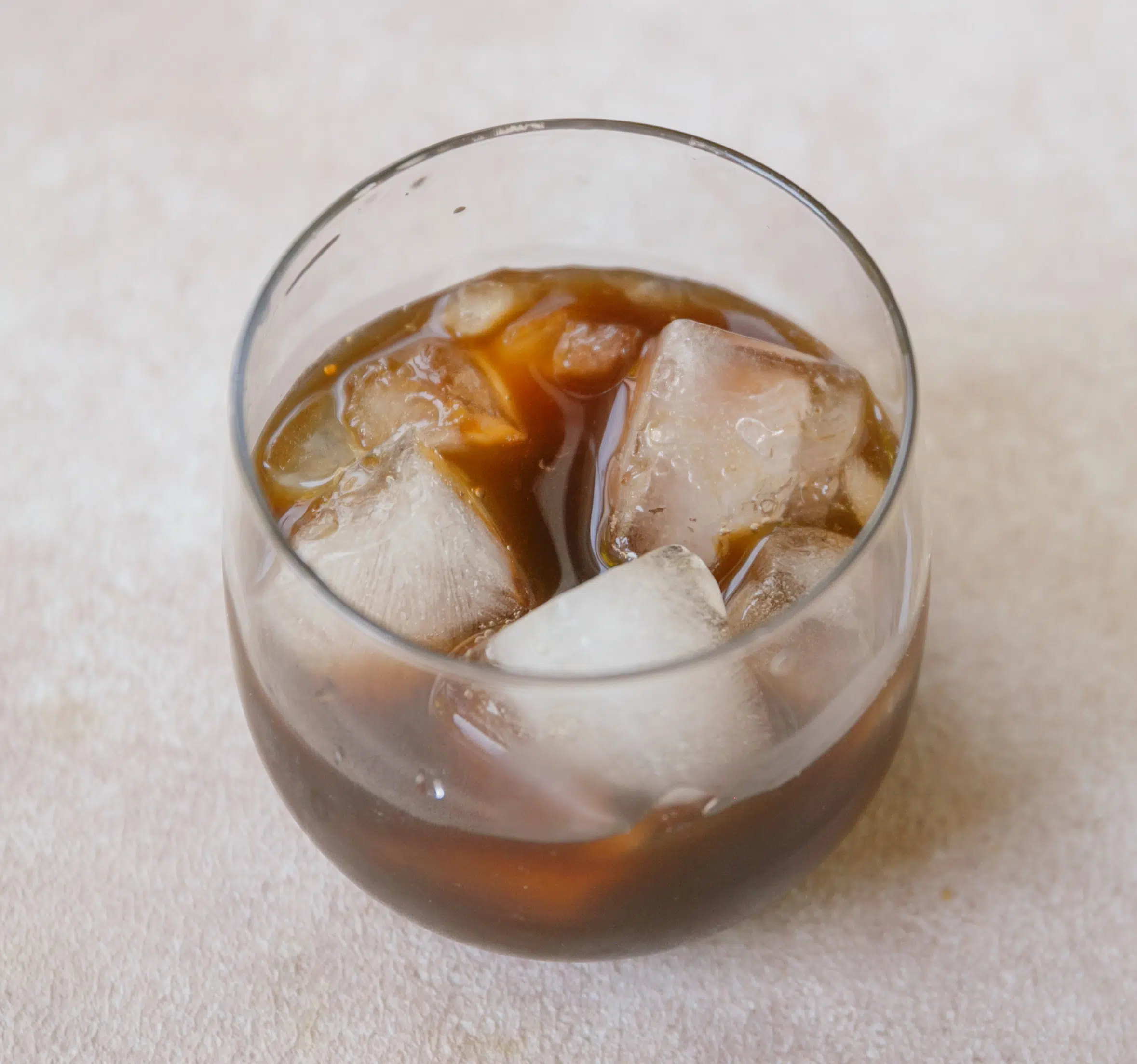 espresso mixture with ice cubes in a glass