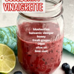 blueberry vinaigrette in mason jar with text overlay