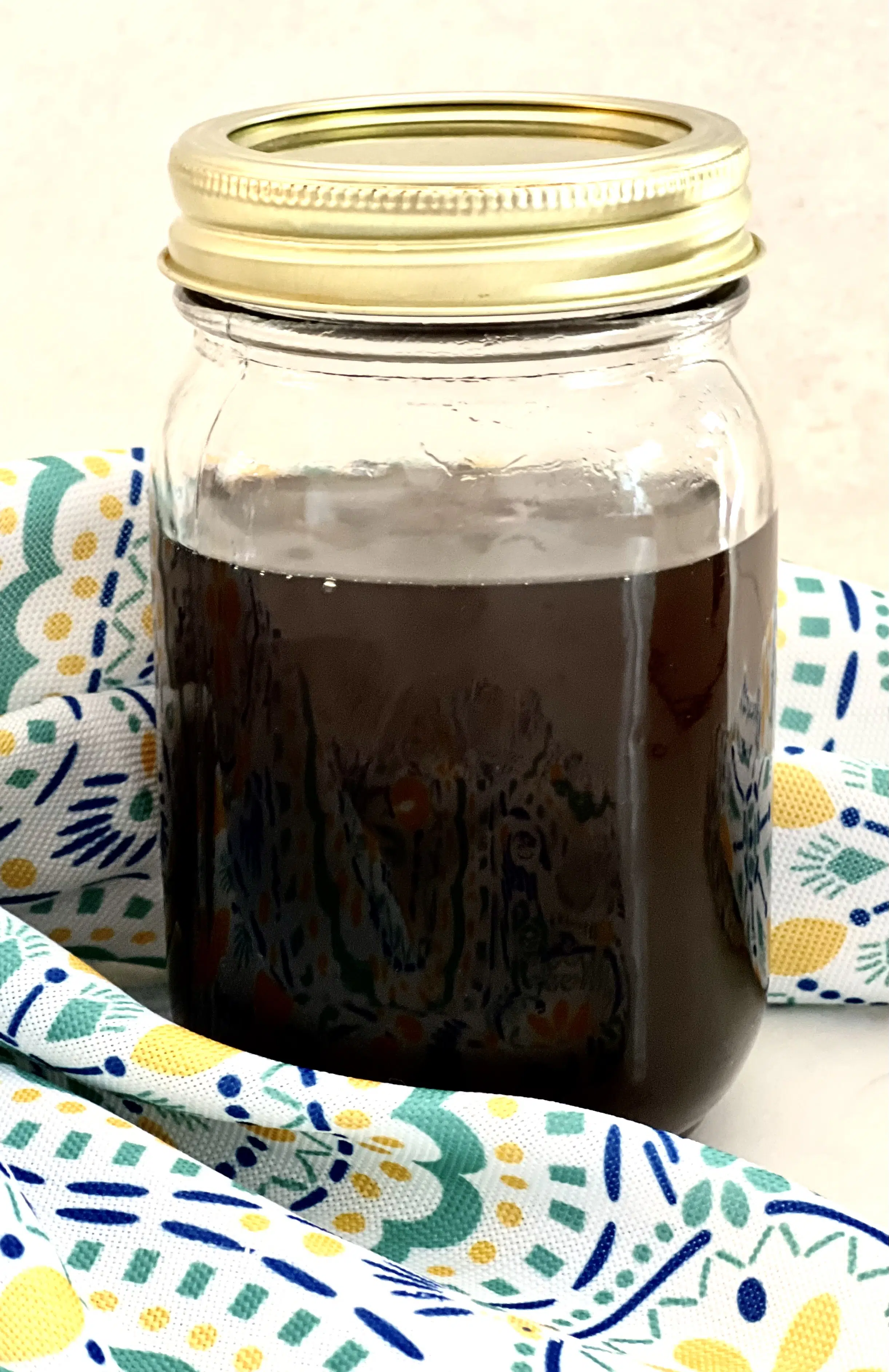 sugar syrup in mason jar with a top