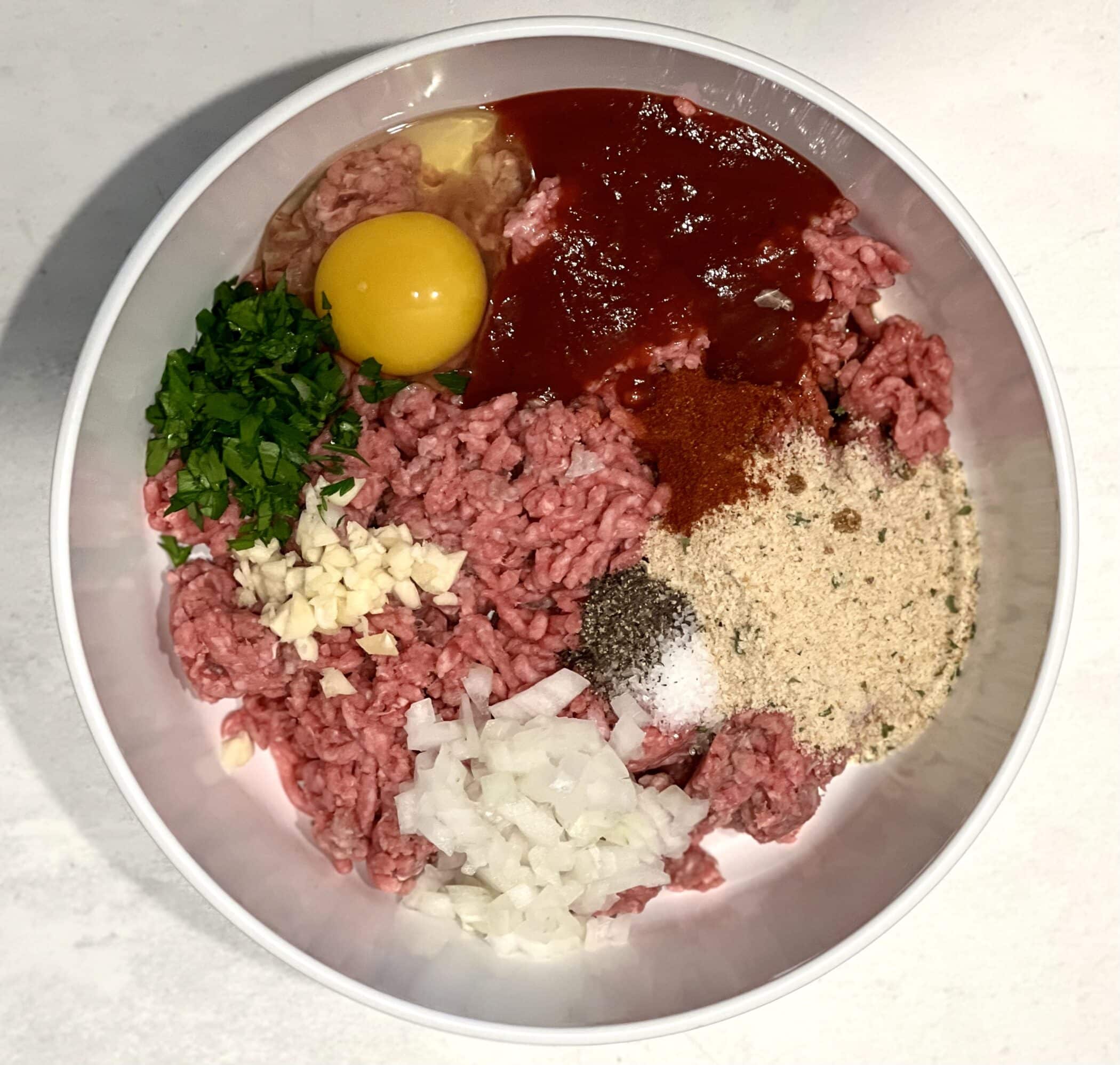 meatloaf ingredients in a mixing bowl