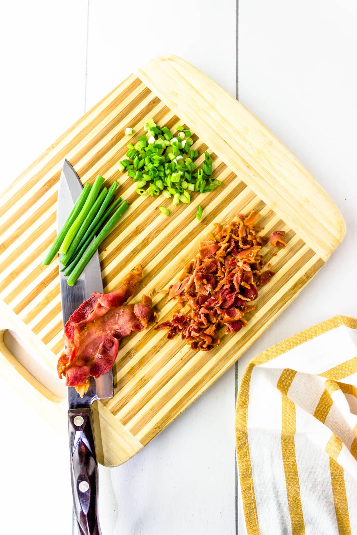 chopping scallions and bacon