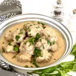 swedish meatballs and sauce in a bowl