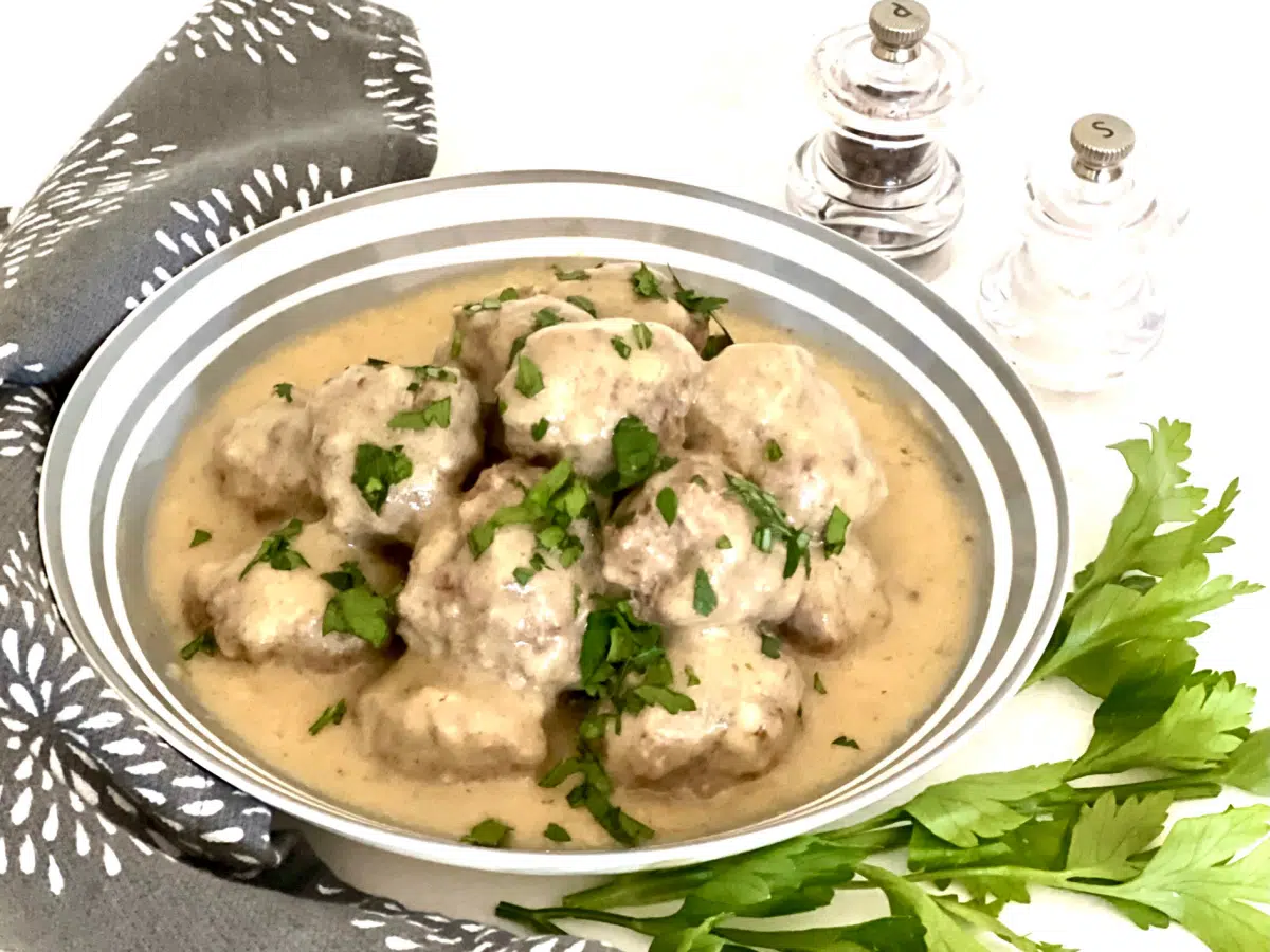 swedish meatballs and sauce in a bowl