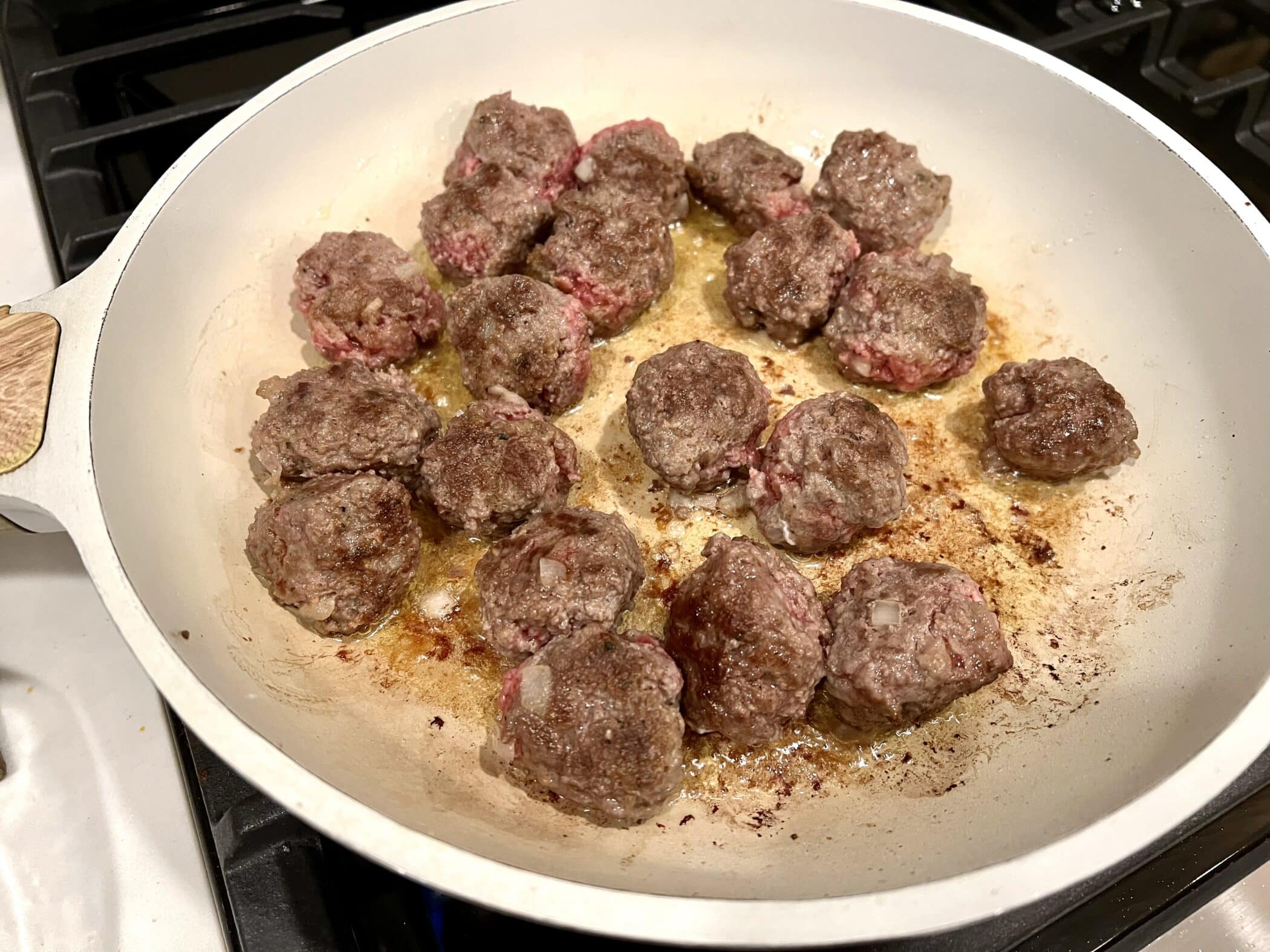 browning the meatballs in a skillet