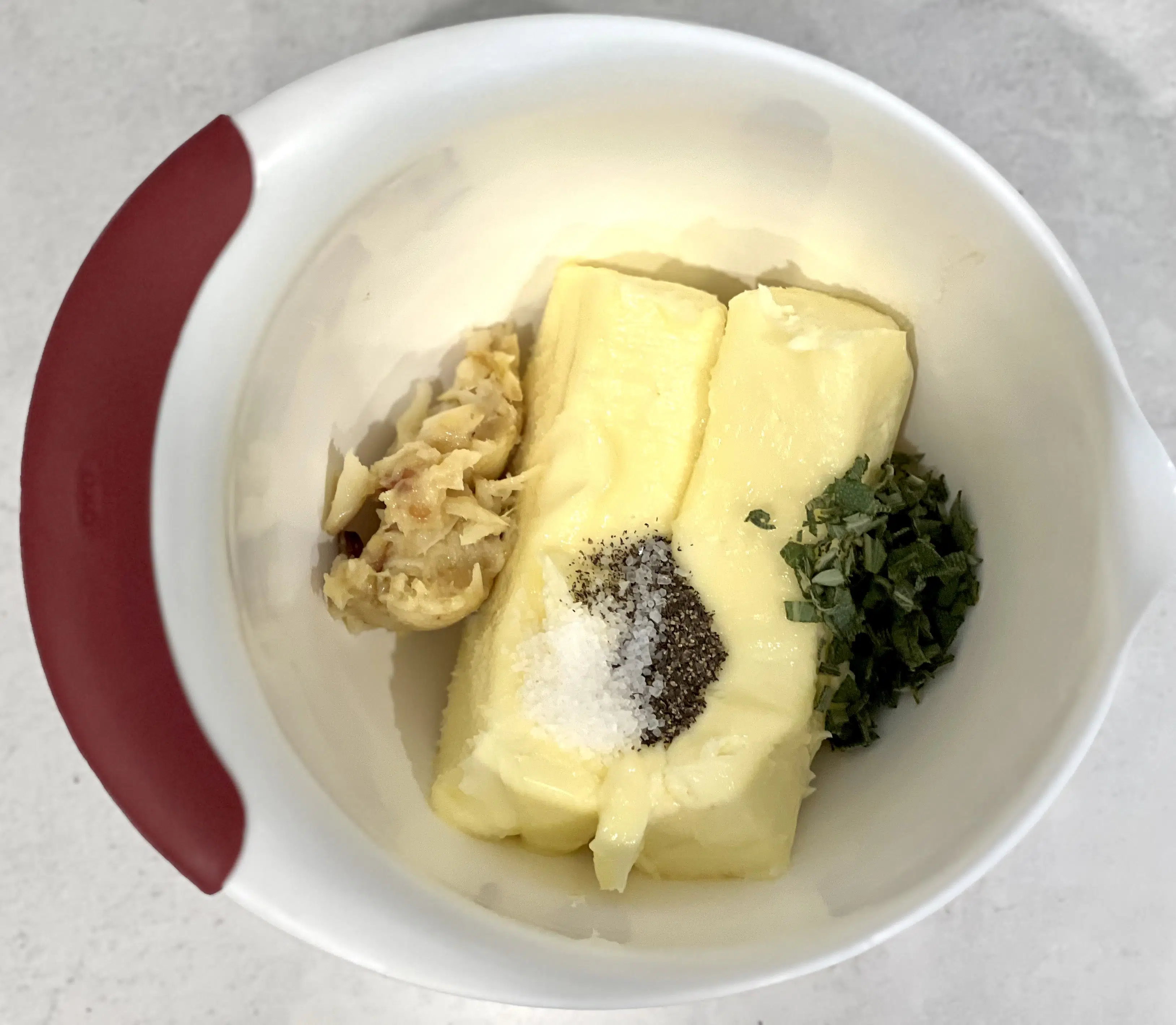 butter board ingredients in a mixing bowl