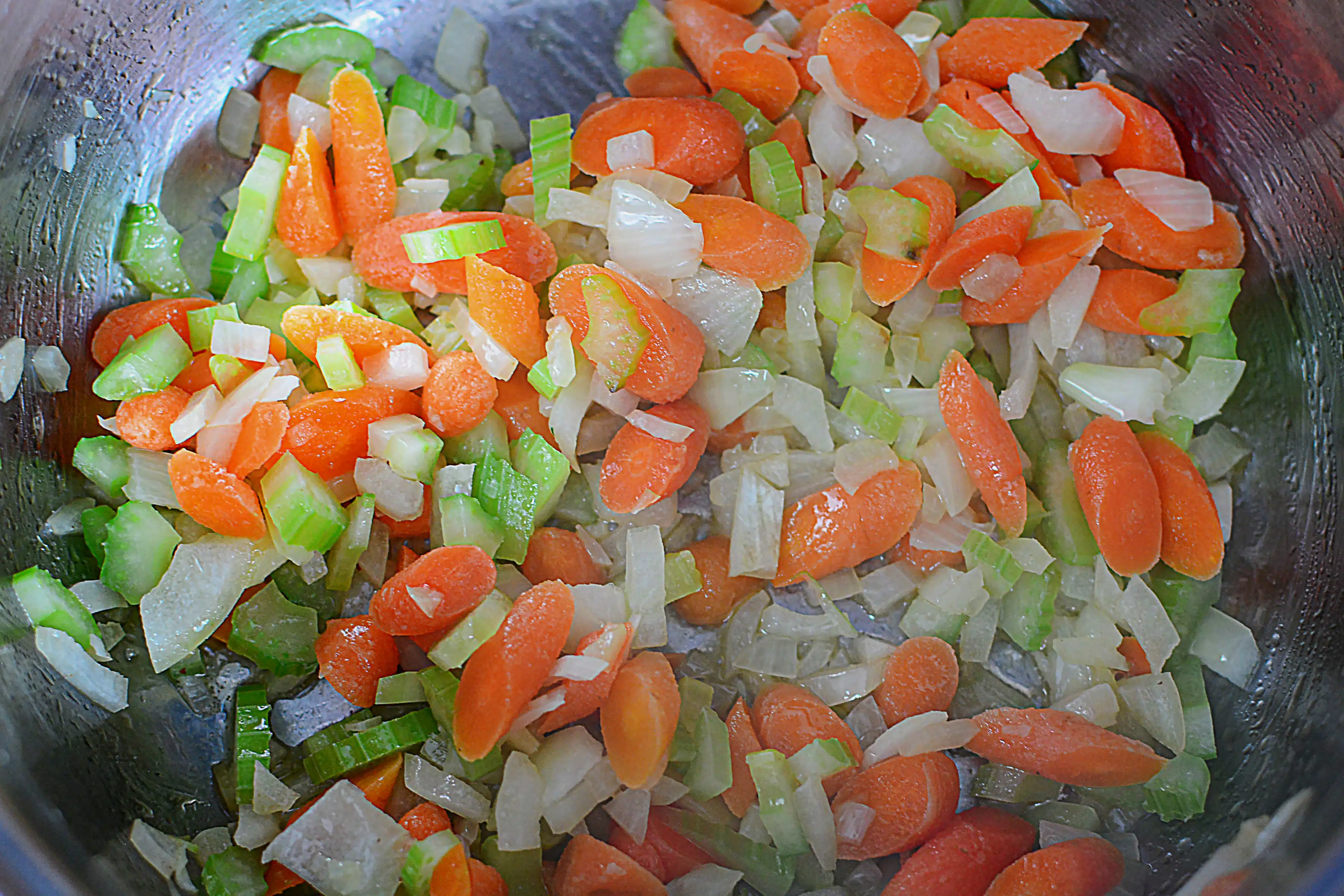 cooking carrots, onion and celery
