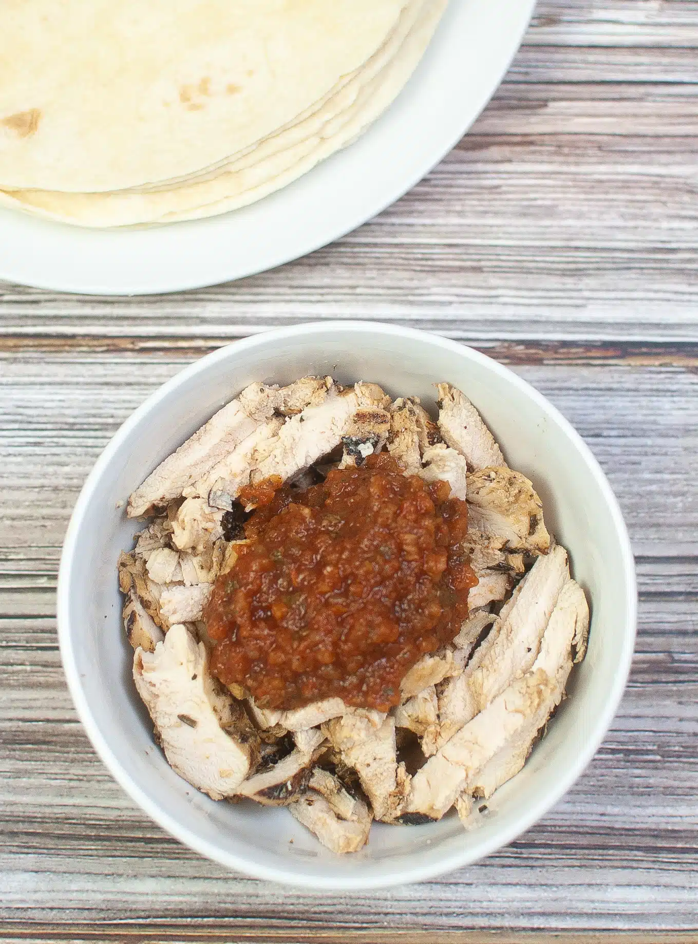 salsa and chicken in a bowl