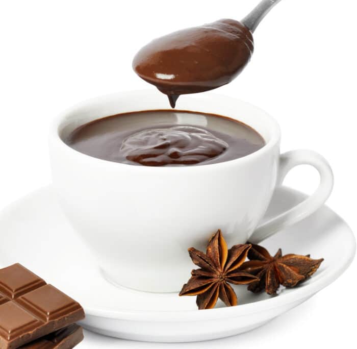 Italian hot chocolate in white cup with spoon