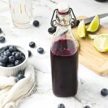 blueberry simple syrup in a bottle
