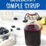 homemade blueberry simple syru in a bottle with text overlay