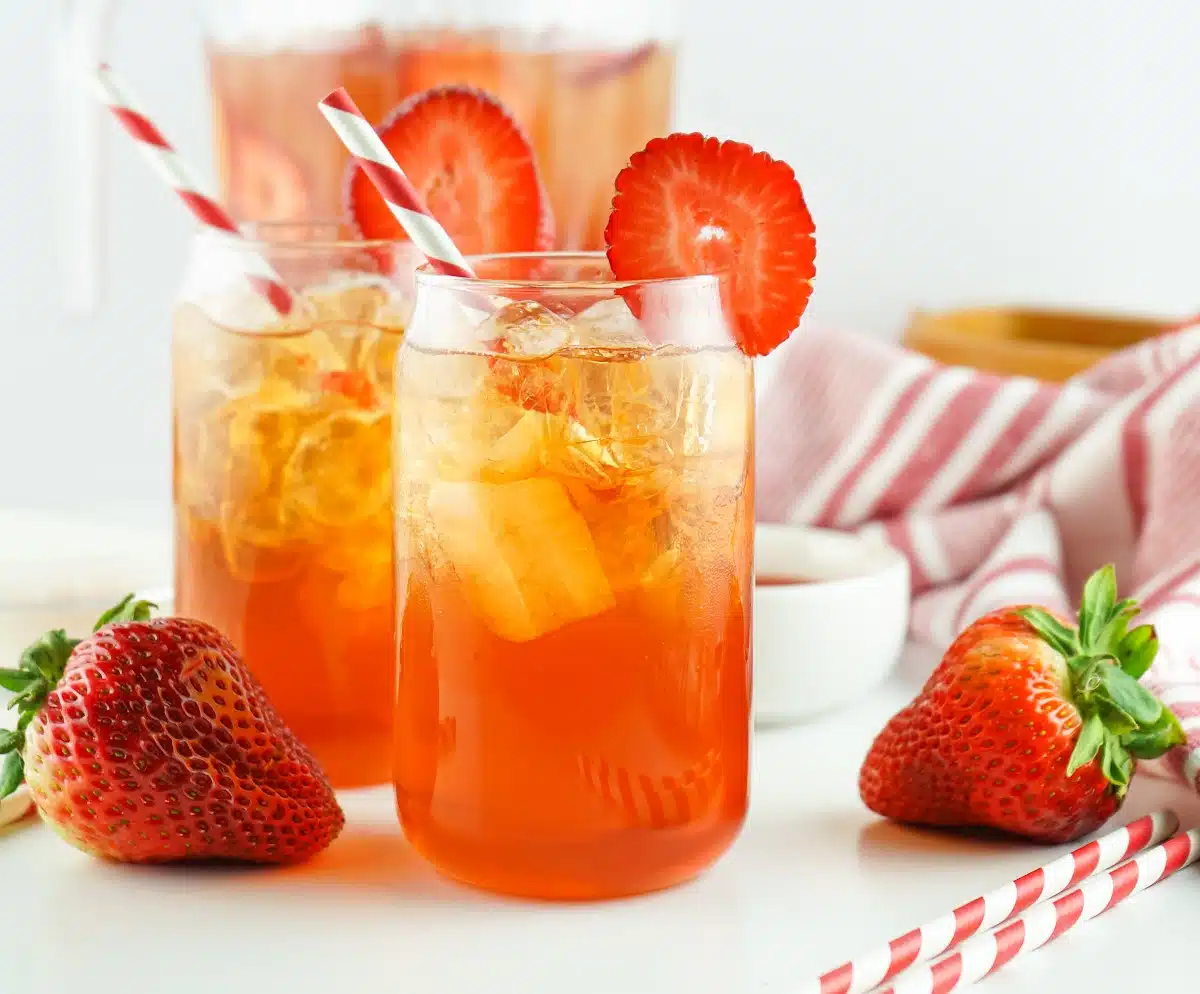 strawberry tea in glasses with straws