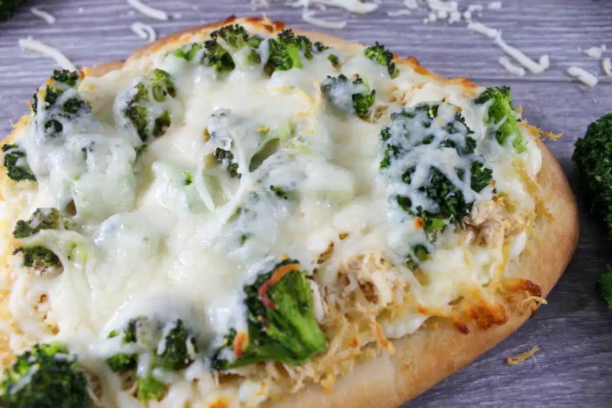 chicken naan with broccoli and alfredo sauce