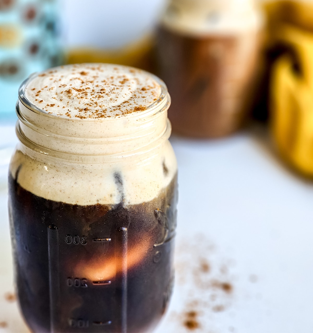 pumpkin cream cold brew in a mason jar