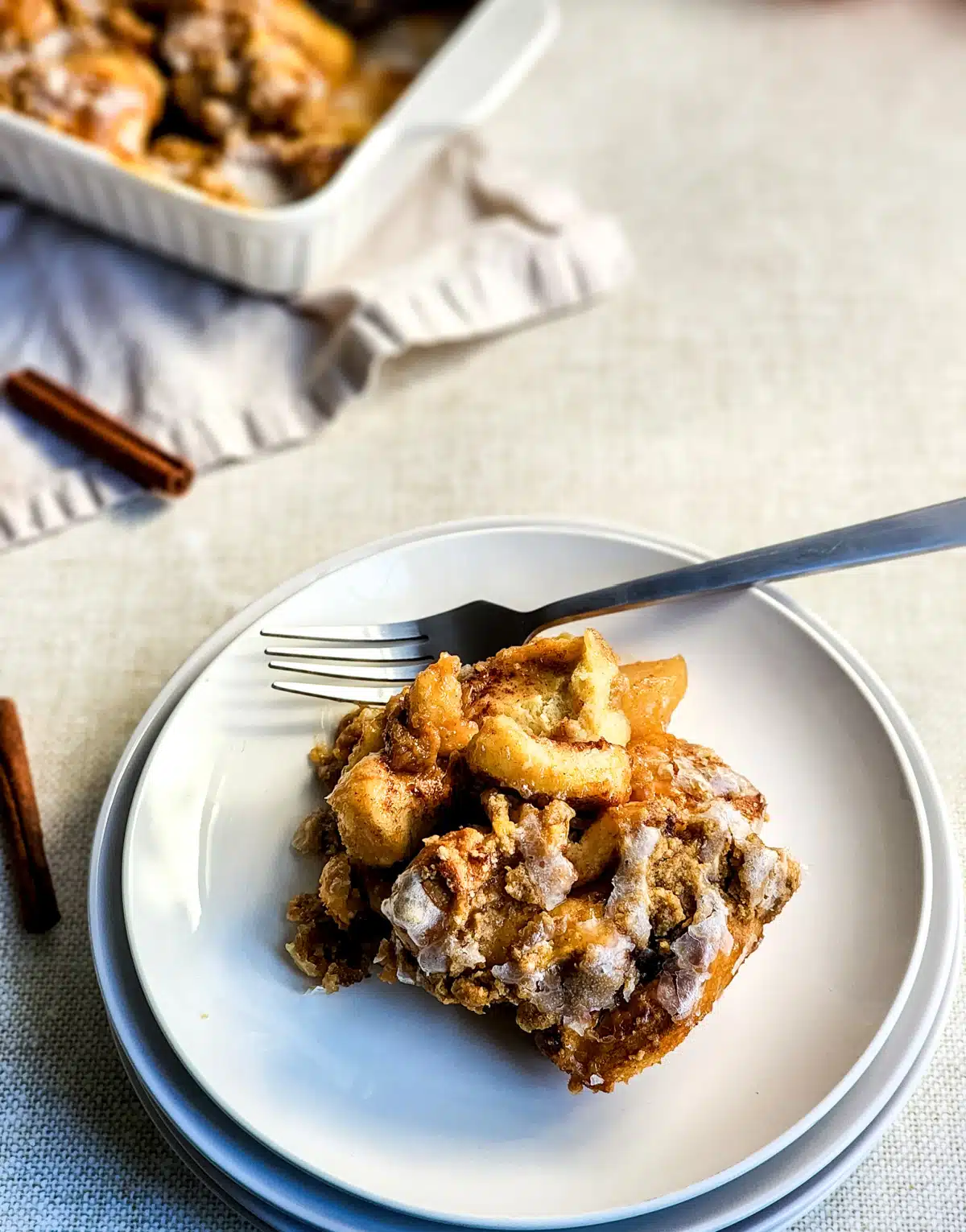 serving of apple pie cinnamon crumble with a fork