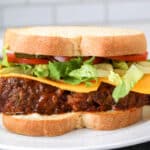leftover meatloaf sandwich on a white plate