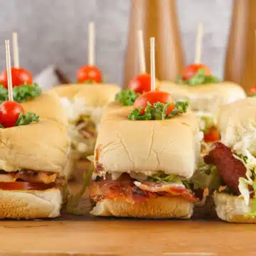 BLT sliders on a wooden board