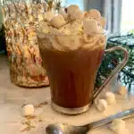 cup of hot chocolate coffee with whipped cream and marshmallows