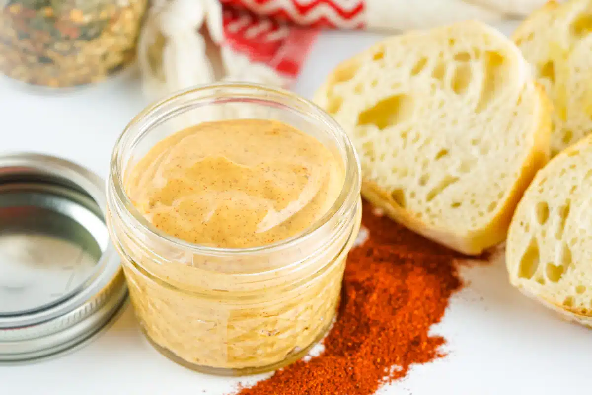 chipotle mayo in a mason jar with bread slices
