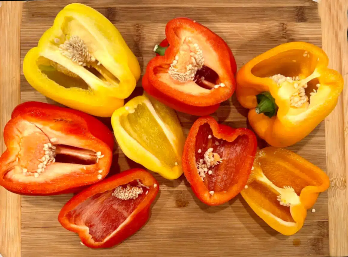 red bell peppers, orange bell pepper and yellow bell pepper