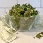 air fryer kale chips in a glass bowl