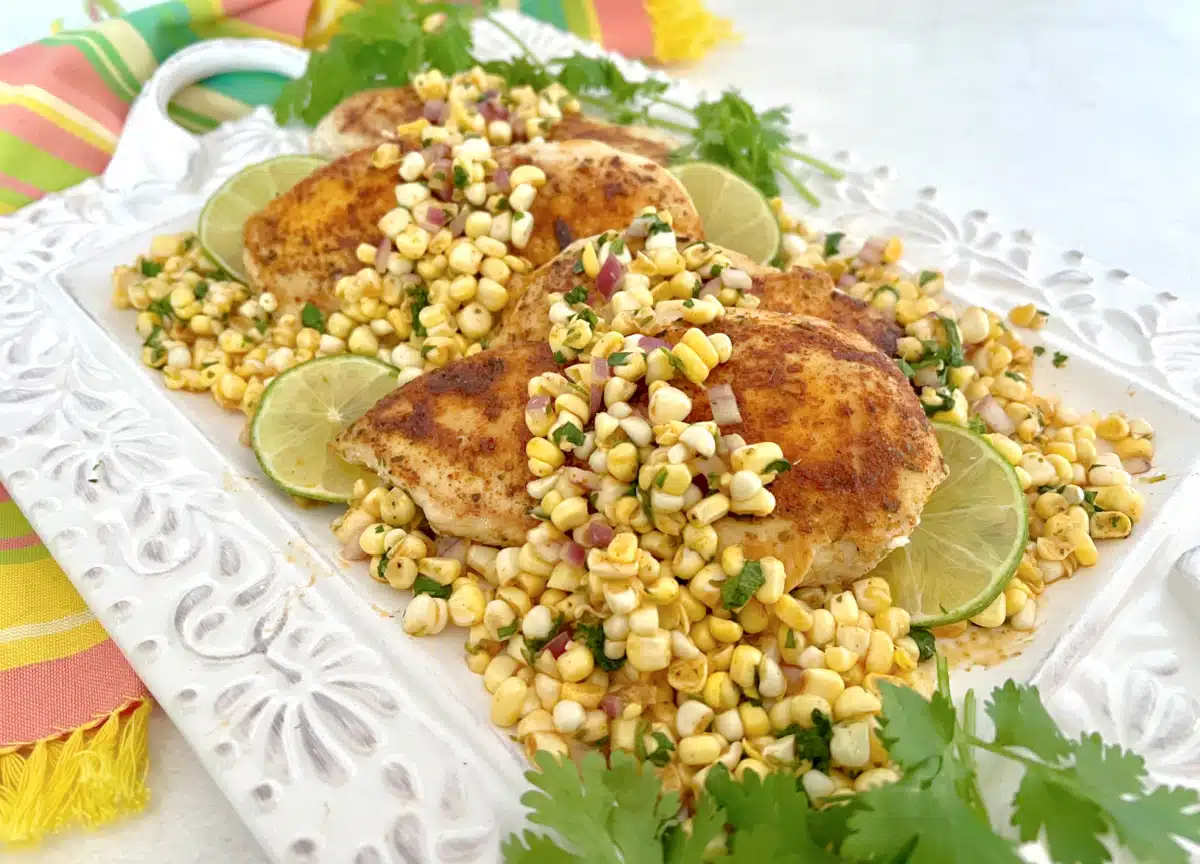 cilantro lime chicken with corn salsa on a platter