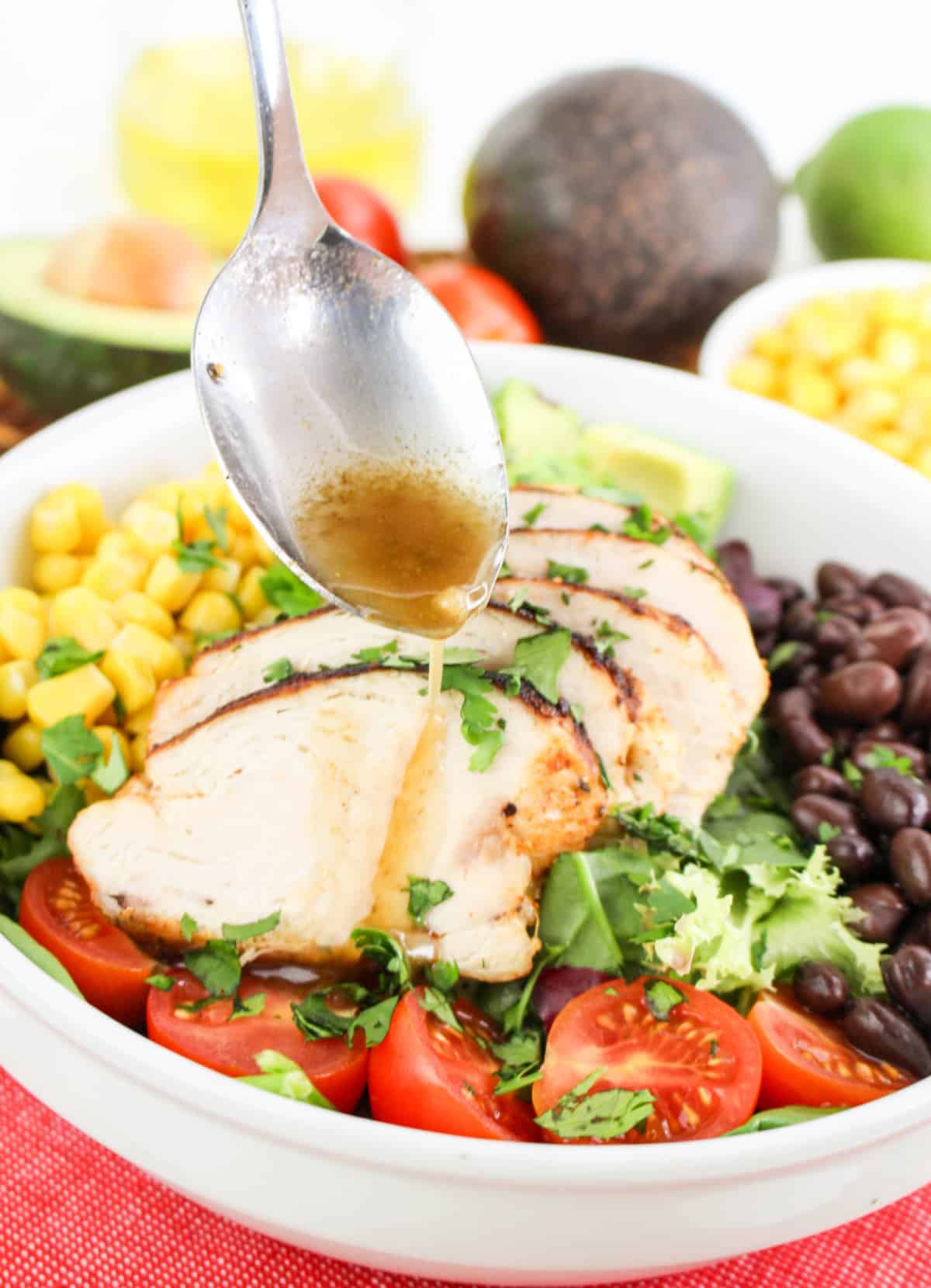southwest chicken salad drizzled with salad dressing