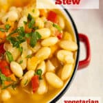 Butter Bean Stew in a red bowl with handles and text overlay