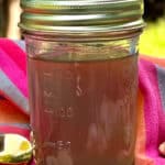 ginger syrup in mason jar with text overlay