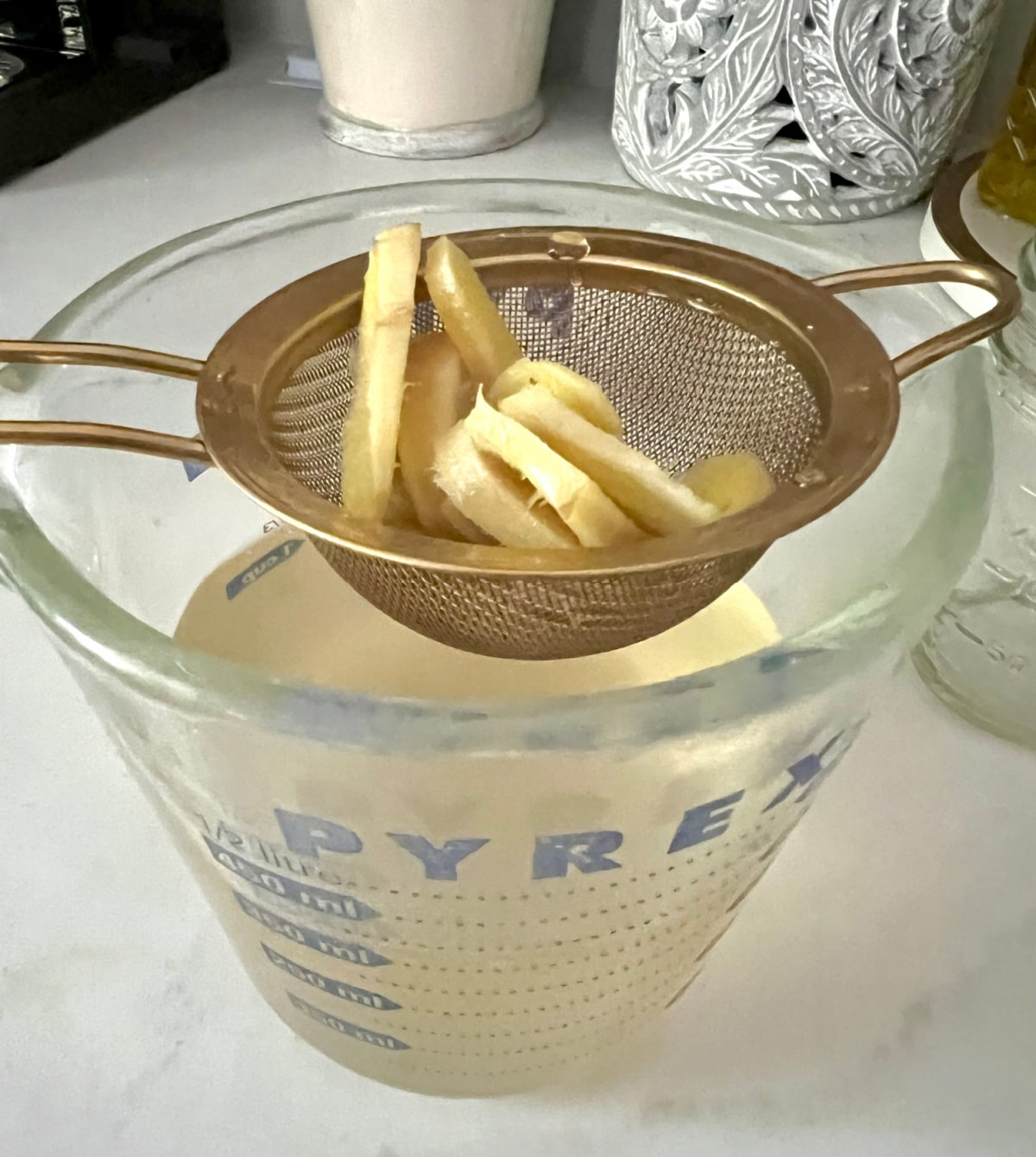 straining ginger syrup step 2