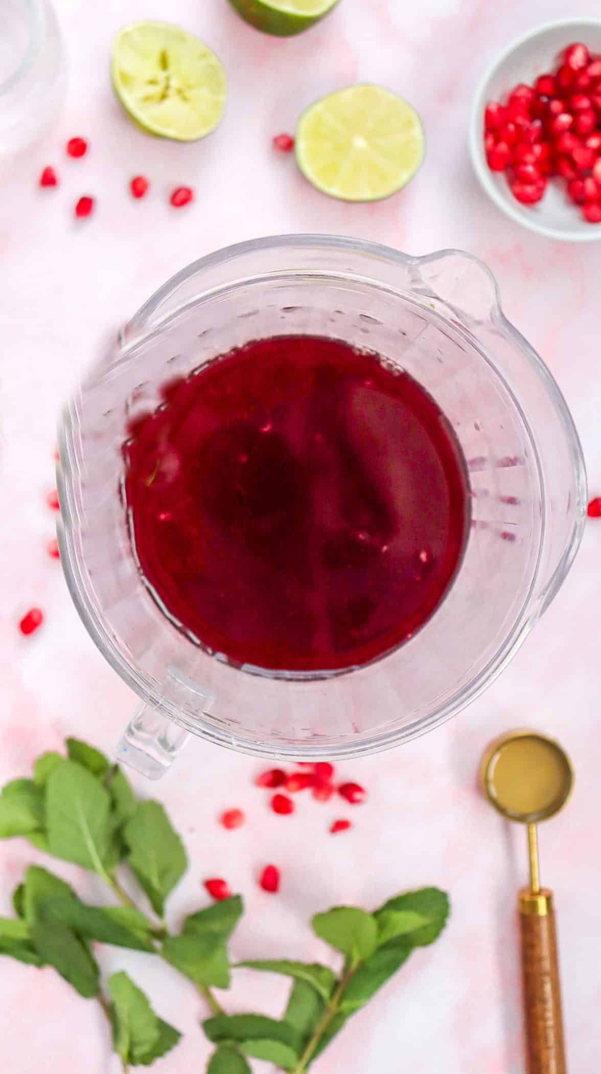 making a pomegranate mocktail