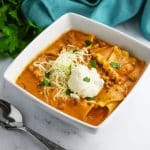 bowl of slow cooker lasagna soup with a dollop of ricotta cheese on top