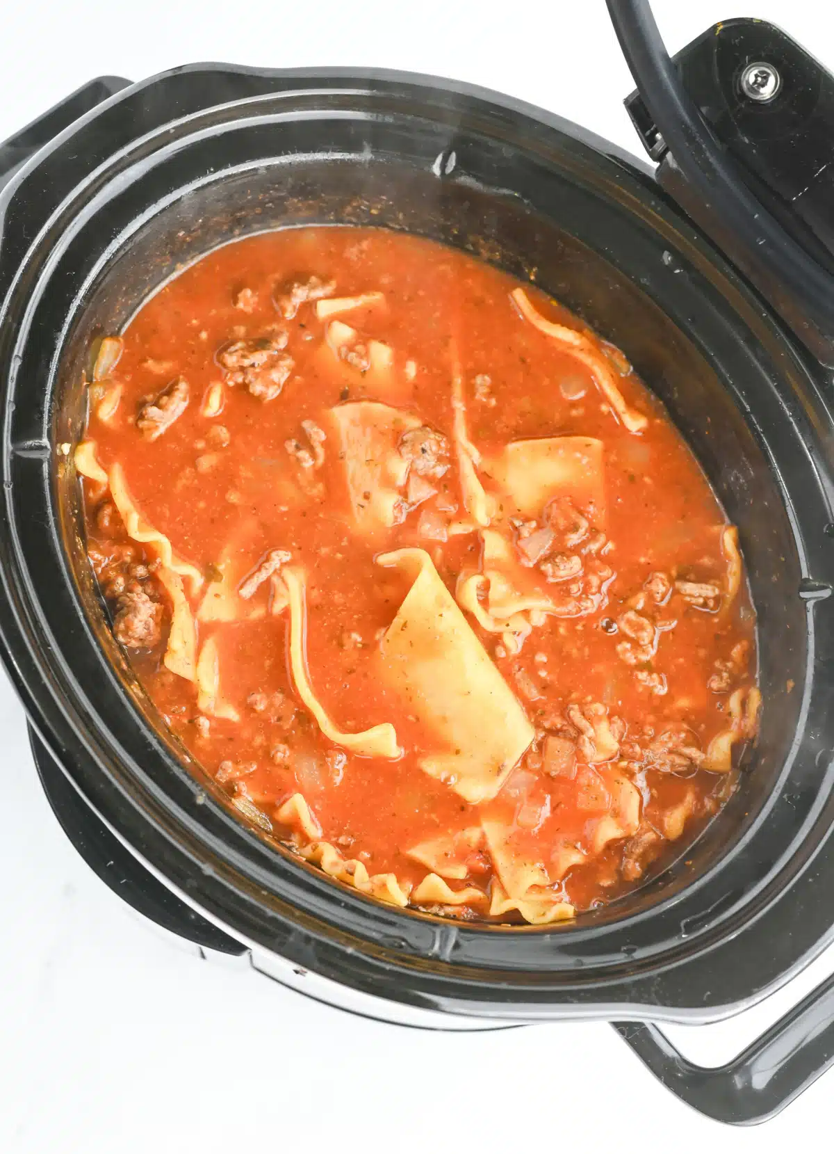 adding lasagna noodles to the crockpot